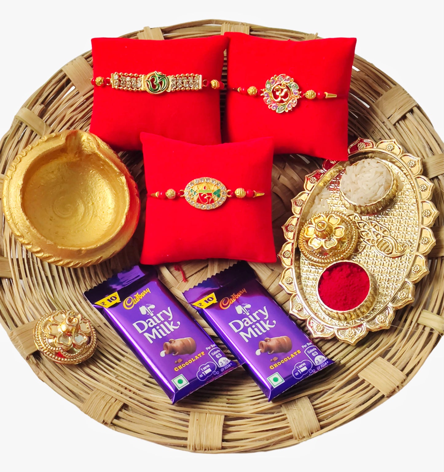Hopedra Living Premium Raksha Bandhan Rakhi Hamper | 3 Designer Om Rakhis with Puja Thali, Diya, Roli Chawal & Dairy Milk Chocolates | Festive Gift Basket for Brother
